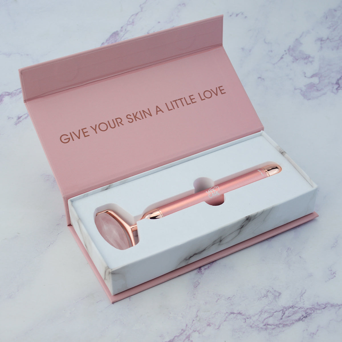 Dispozitiv pentru Masajul Fetei cu Vibratii, din Cuart Roz