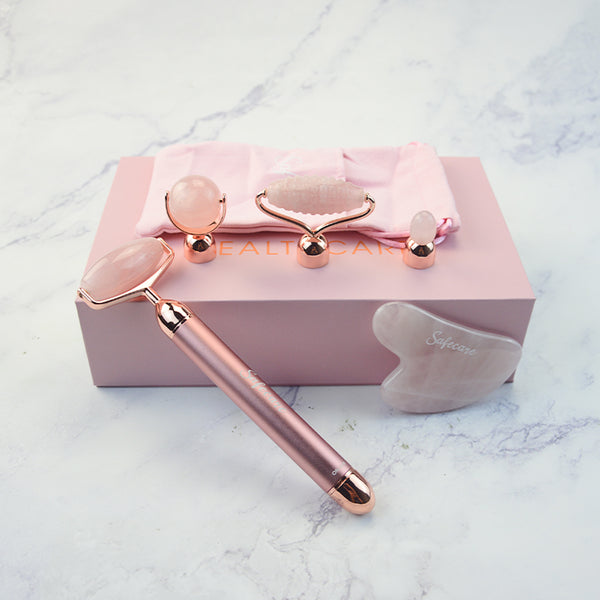 Set cu Dispozitiv Electric cu Vibratii pentru Masaj Facial si Accesorii din Cuart Roz